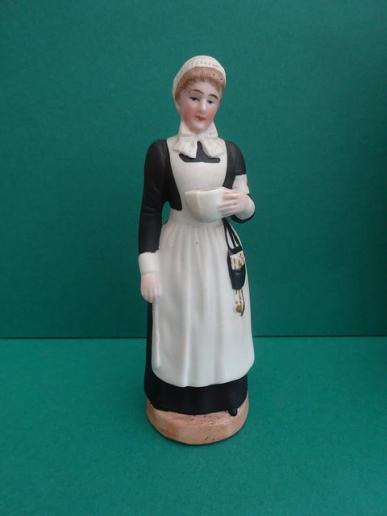 Bisque Victorian Nurse Figurine