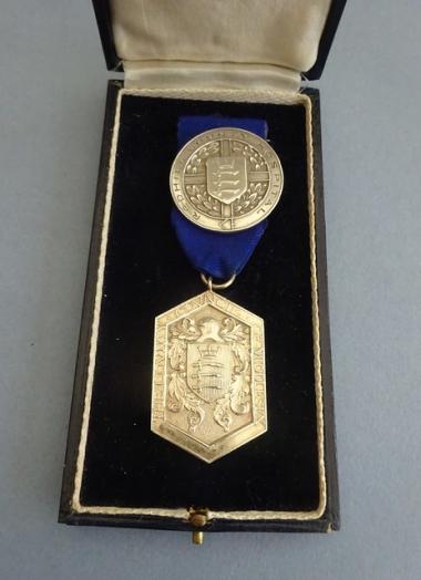 The County Council of Middlesex,Prize Medal and Redhill County Hospital Silver badge pair.
