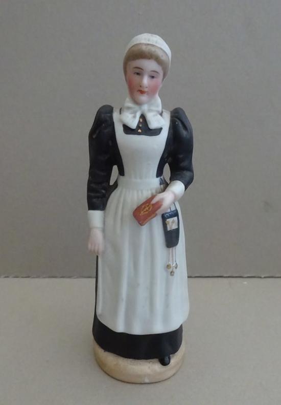 Bisque Victorian Nurse Figurine