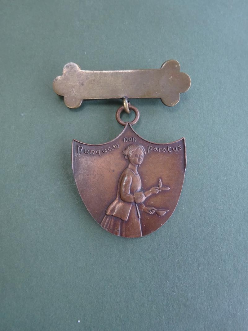 Nunquam Non Paratus, Early Nursing/Midwifery Badge