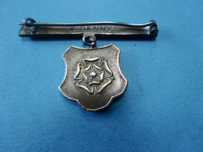 Northampton General Hospital, brass nurses badge