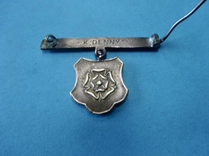 Northampton General Hospital, brass nurses badge